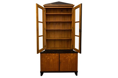 Lot 402 - A BIEDERMEIER-STYLE EBONY AND WALNUT BOOKCASE