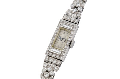 Lot 82 - AN ART DECO DIAMOND COCKTAIL WATCH