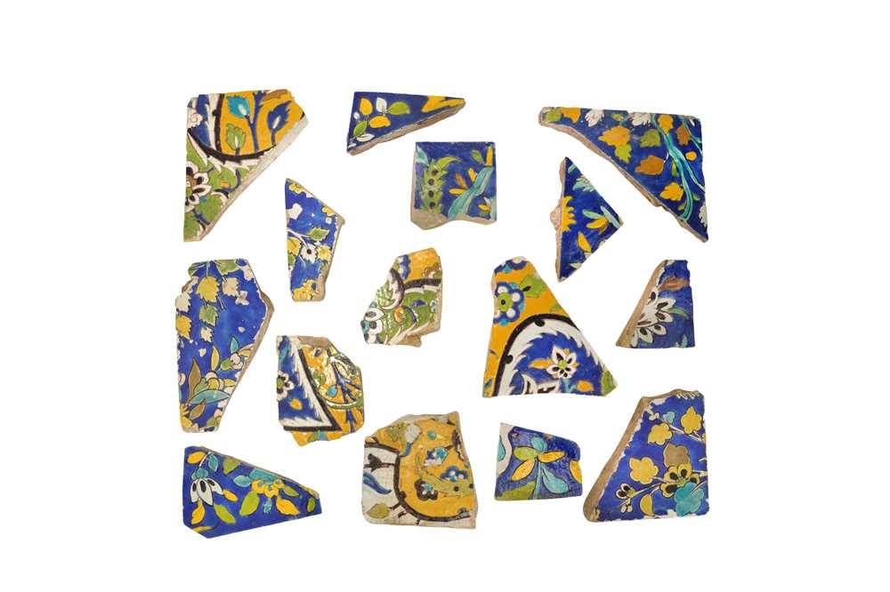 Lot 289 - FIFTEEN FRAGMENTS OF SAFAVID CUERDA SECA POTTERY TILES