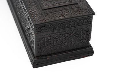 Lot 262 - A CARVED EBONY ANGLO-INDIAN LIDDED BOX