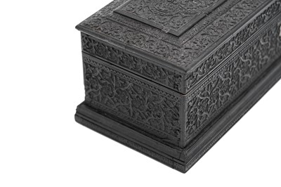 Lot 262 - A CARVED EBONY ANGLO-INDIAN LIDDED BOX