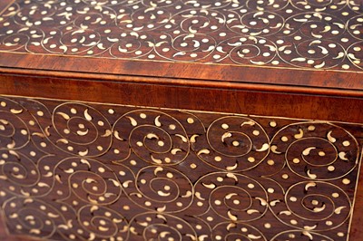Lot 233 - λ A SMALL INDO-PORTUGUESE CARVED ROSEWOOD IVORY-INLAID PORTABLE TABLE CABINET (VARGUENO)