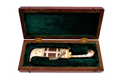 Lot 218 - λ A COMMEMORATIVE SILVER AND GOLD-MOUNTED PICHANGATTI DAGGER AND ITS SHEATH