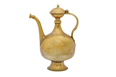 Lot 187 - A PLAIN MUGHAL INDIAN BRASS AFTABA (EWER)