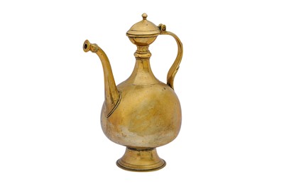 Lot 187 - A PLAIN MUGHAL INDIAN BRASS AFTABA (EWER)