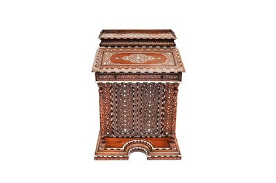 Lot 213 - λ A CARVED HARDWOOD ANGLO-INDIAN IVORY AND EBONY-INLAID DAVENPORT DESK WITH VEGETAL DESIGNS
