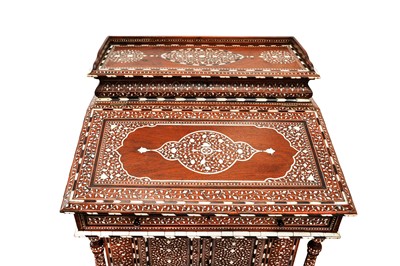Lot 213 - λ A CARVED HARDWOOD ANGLO-INDIAN IVORY AND EBONY-INLAID DAVENPORT DESK WITH VEGETAL DESIGNS