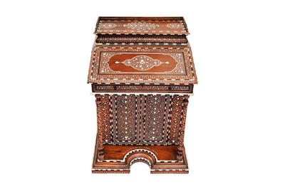 Lot 213 - λ A CARVED HARDWOOD ANGLO-INDIAN IVORY AND EBONY-INLAID DAVENPORT DESK WITH VEGETAL DESIGNS
