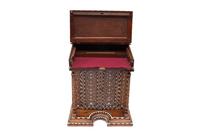Lot 213 - λ A CARVED HARDWOOD ANGLO-INDIAN IVORY AND EBONY-INLAID DAVENPORT DESK WITH VEGETAL DESIGNS
