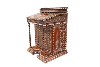 Lot 213 - λ A CARVED HARDWOOD ANGLO-INDIAN IVORY AND EBONY-INLAID DAVENPORT DESK WITH VEGETAL DESIGNS