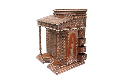 Lot 213 - λ A CARVED HARDWOOD ANGLO-INDIAN IVORY AND EBONY-INLAID DAVENPORT DESK WITH VEGETAL DESIGNS