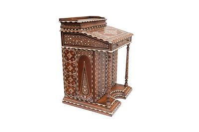 Lot 213 - λ A CARVED HARDWOOD ANGLO-INDIAN IVORY AND EBONY-INLAID DAVENPORT DESK WITH VEGETAL DESIGNS