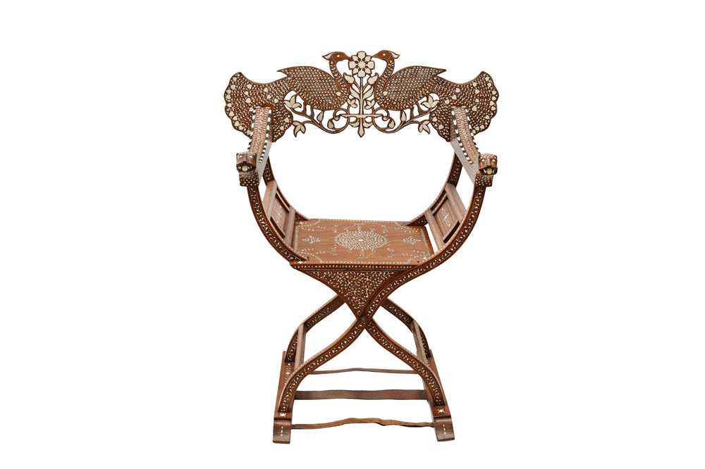 Lot 212 - λ A HARDWOOD ANGLO-INDIAN IVORY AND EBONY-INLAID ARMCHAIR