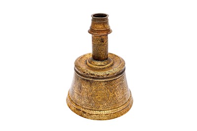 Lot 365 - AN IMPRESSIVE LARGE MAMLUK ENGRAVED BRASS CANDLESTICK WITH THE SCRIBE INSIGNIA