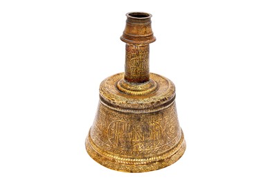 Lot 365 - AN IMPRESSIVE LARGE MAMLUK ENGRAVED BRASS CANDLESTICK WITH THE SCRIBE INSIGNIA