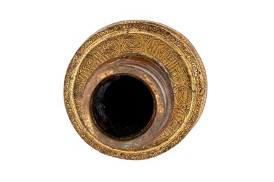 Lot 365 - AN IMPRESSIVE LARGE MAMLUK ENGRAVED BRASS CANDLESTICK WITH THE SCRIBE INSIGNIA