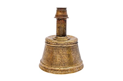 Lot 365 - AN IMPRESSIVE LARGE MAMLUK ENGRAVED BRASS CANDLESTICK WITH THE SCRIBE INSIGNIA