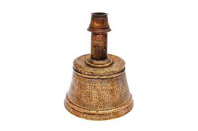 Lot 365 - AN IMPRESSIVE LARGE MAMLUK ENGRAVED BRASS CANDLESTICK WITH THE SCRIBE INSIGNIA