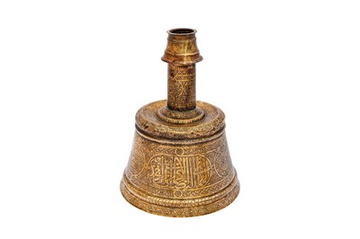 Lot 365 - AN IMPRESSIVE LARGE MAMLUK ENGRAVED BRASS CANDLESTICK WITH THE SCRIBE INSIGNIA