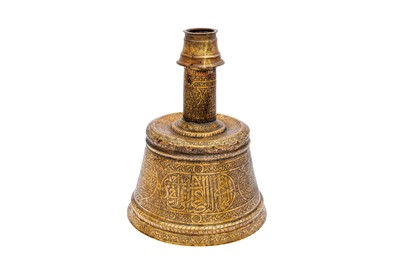 Lot 365 - AN IMPRESSIVE LARGE MAMLUK ENGRAVED BRASS CANDLESTICK WITH THE SCRIBE INSIGNIA