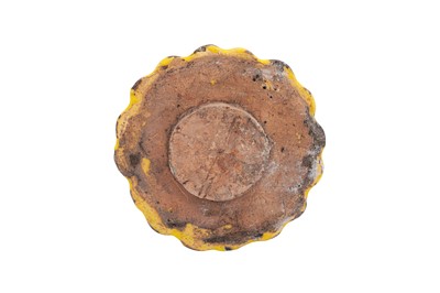 Lot 269 - A MOULDED YELLOW-GLAZED MUGHAL ARCHITECTURAL FLORAL TILE