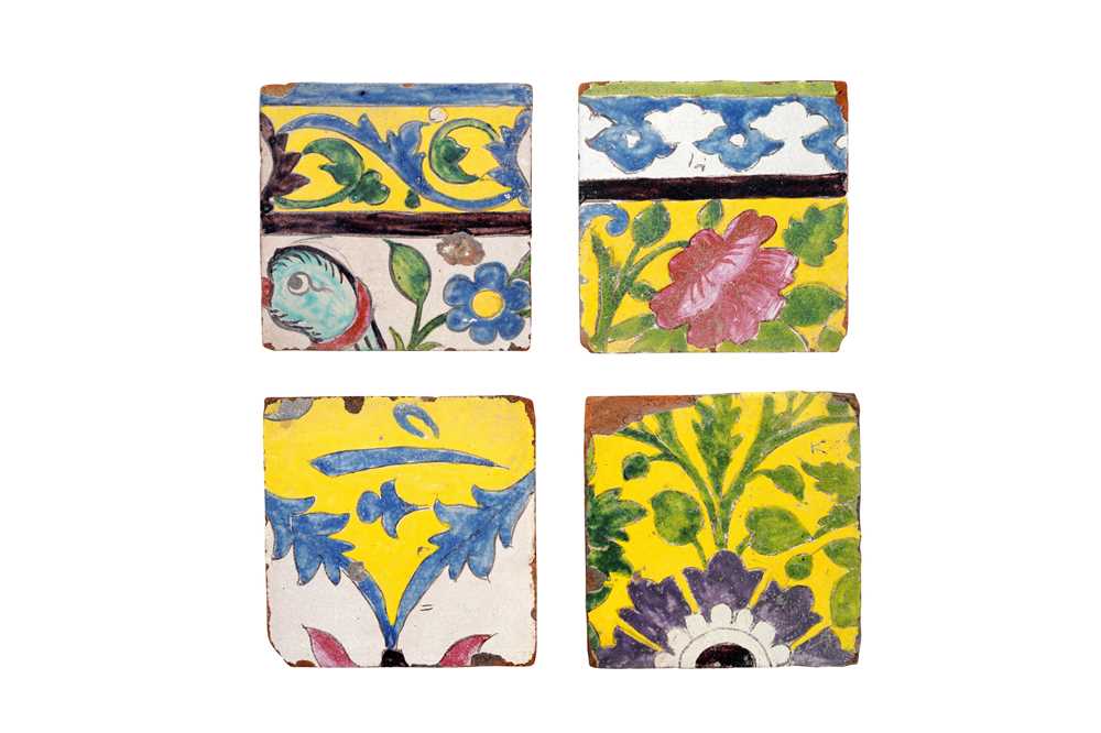 Lot 293 - FOUR SQUARE FRAGMENTS OF CUERDA SECA POTTERY TILES