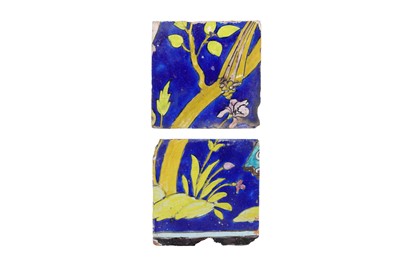 Lot 282 - A PANEL OF TWO CUERDA SECA POTTERY TILES WITH VEGETATION