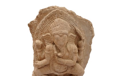Lot 3 - A SMALL CARVED SANDSTONE STELE WITH FOUR-ARMED GANESHA