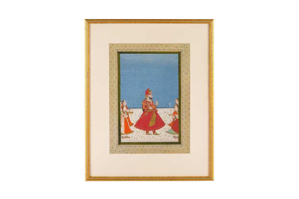 Lot 199 - A STANDING PORTRAIT OF A RAJPUT RULER WITH