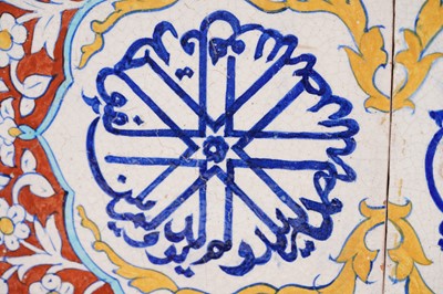 Lot 273 - A PANEL OF TWO POLYCHROME-PAINTED MULTAN POTTERY TILES WITH CALLIGRAPHIC MEDALLIONS