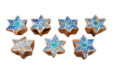 Lot 270 - SEVEN SIX-POINTED ARCHITECTURAL STAR-SHAPED BLUE AND WHITE POTTERY TILES