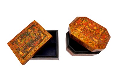 Lot 260 - TWO KASHMIRI POLYCHROME-PAINTED AND LACQUERED PAPIER-MÂCHÉ LIDDED BOXES WITH FIGURAL MOTIFS