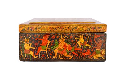 Lot 260 - TWO KASHMIRI POLYCHROME-PAINTED AND LACQUERED PAPIER-MÂCHÉ LIDDED BOXES WITH FIGURAL MOTIFS