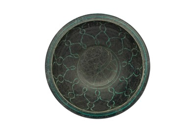 Lot 19 - A KASHAN BLACK AND TURQUOISE SILHOUETTE POTTERY BOWL