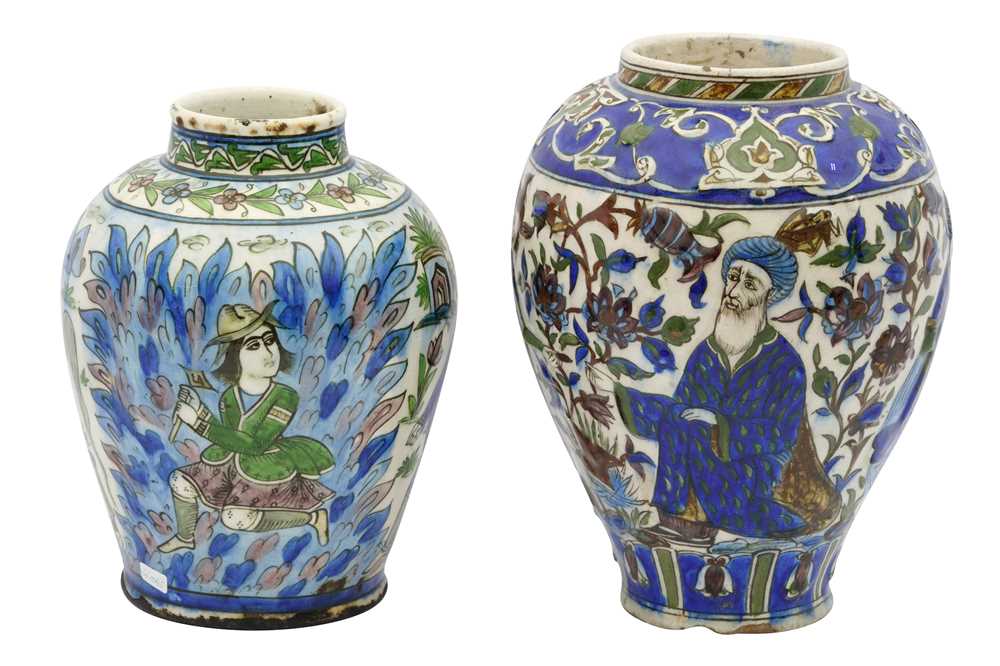 Lot 52 - TWO POLYCHROME-PAINTED FIGURAL POTTERY VASES