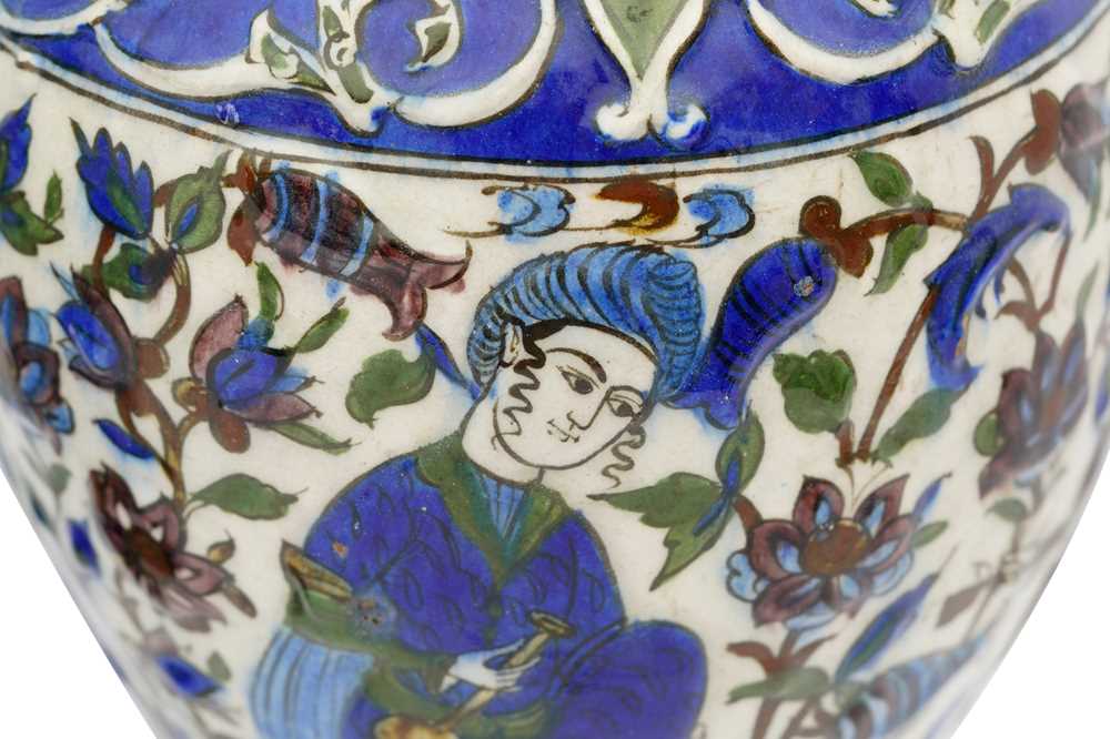 Lot 52 - TWO POLYCHROME-PAINTED FIGURAL POTTERY VASES