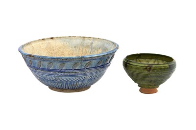 Lot 15 - AN OLIVE GREEN-GLAZED INCISED POTTERY BOWL AND A MONUMENTAL COBALT BLUE-GLAZED POTTERY BOWL