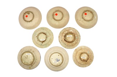 Lot 68 - EIGHT POLYCHROME-PAINTED POTTERY DISHES WITH AVIARY AND VEGETAL MOTIFS