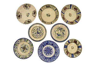 Lot 68 - EIGHT POLYCHROME-PAINTED POTTERY DISHES WITH AVIARY AND VEGETAL MOTIFS