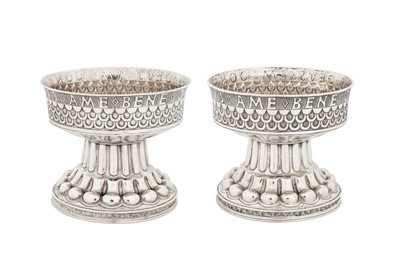 Lot 335 - A pair of Edwardian sterling silver replica of the Holms Cup bowls, Chester 1906 by Nathan and Hayes