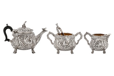 Lot 333 - A heavy Edwardian sterling silver ‘Teniers’ three-piece tea service, London 1904 by Sydney Bellamy Harman