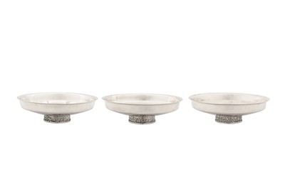 Lot 261 - Three Elizabeth II modernist sterling silver dishes, London 1975 by Christopher Nigel Lawrence (b. 1936)