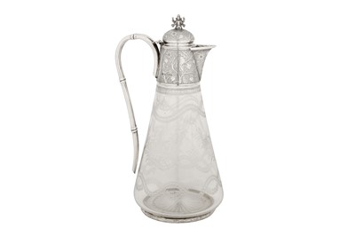 Lot 364 - A Victorian Scottish sterling silver mounted glass ‘aesthetic’ claret jug, Edinburgh 1875 by Hamilton and Inches