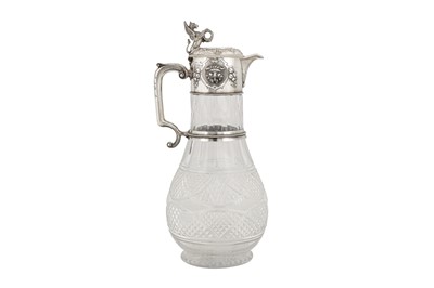 Lot 363 - A Victorian sterling silver mounted cut glass claret jug, London 1859 by John Figg