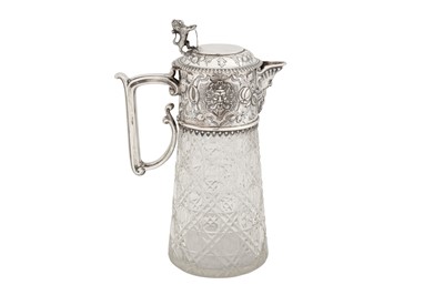 Lot 361 - A Victorian sterling silver mounted glass claret jug, London 1873 by Alexander Macrae