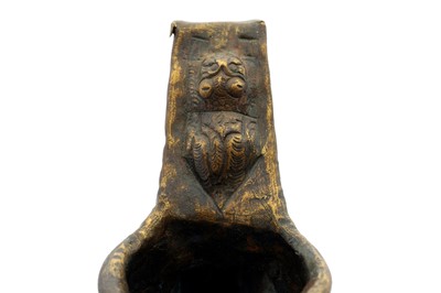 Lot 9 - A COPPER-INLAID BRASS EWER WITH LION AND LUNAR MOTIFS