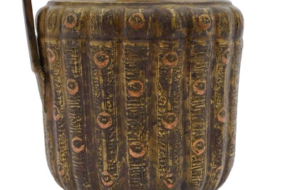 Lot 9 - A COPPER-INLAID BRASS EWER WITH LION AND LUNAR MOTIFS