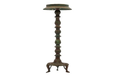 Lot 8 - AN ENGRAVED BRONZE TRIPOD LAMPSTAND