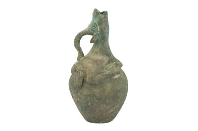 Lot 4 - A SMALL MEDIEVAL BRONZE BOTTLE WITH A PERSIAN GAZELLE SPOUT
