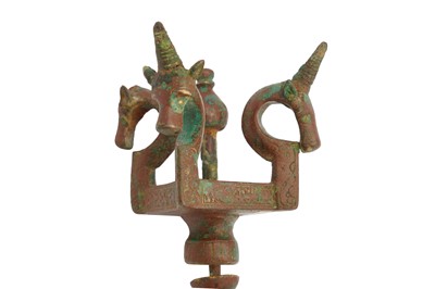 Lot 3 - A MEDIEVAL BRONZE MACE WITH ANIMAL FINIALS AND KUFIC CALLIGRAPHY